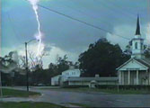 [ Wall cloud passing over First Baptist Church in Waldo, FL - June 16, 2000 ]